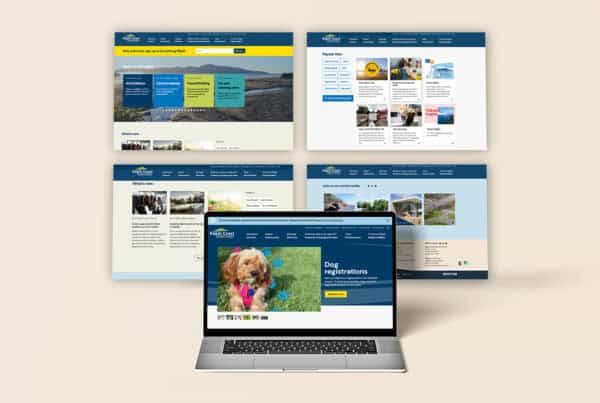 A laptop displaying a website with a dog registration page is in front of four website pages featuring various categories such as community services, local governance, and news updates.